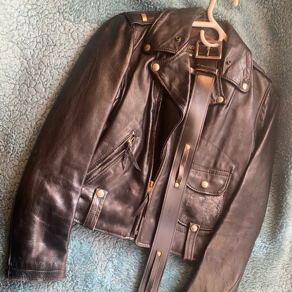 Vintage Buco horse hide leather jacket with matching belt.